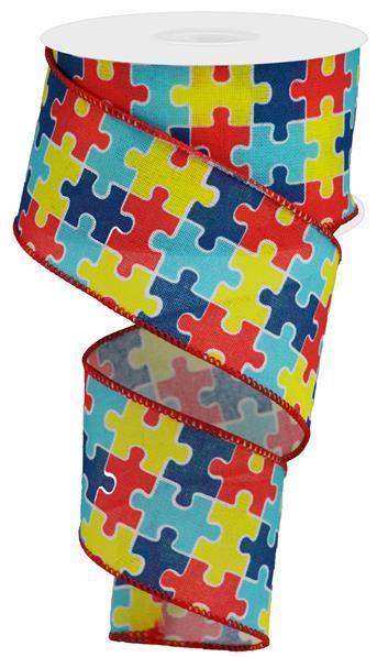 2.5"X10YD RED, BLUE AND YELLOW PUZZLE PIECES ON ROYAL - RGA1523W5